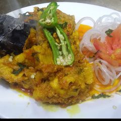 A picture of Smokey  chicken karai.