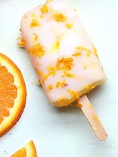 A picture of Orange Creamsicle Popsicles.