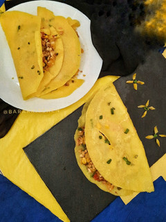 A picture of Stuffed and crispy Turmeric Rice flour Pancake.