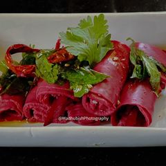 A picture of Beetroot Khandvi.