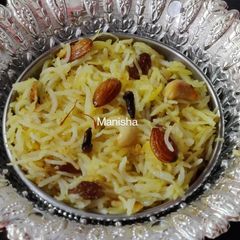 A picture of Rakhi Special - Narali Bhat.