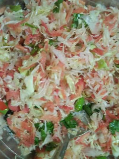 A picture of Cabbage and carrots salad.