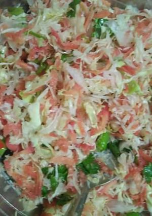 A picture of Cabbage and carrots salad.