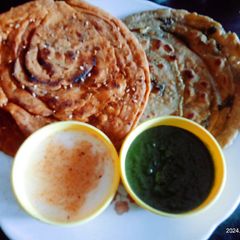 A picture of Healthy tasty multigran Atta and mint leaves lachha paratha.
