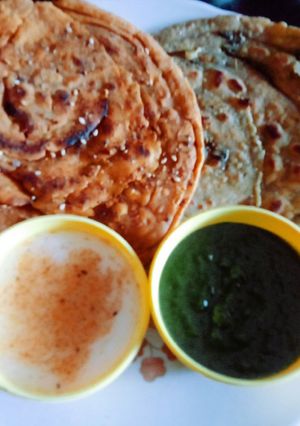 A picture of Healthy tasty multigran Atta and mint leaves lachha paratha.