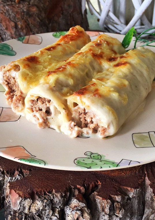 Una foto de Canelones de carne a la catalana y...👴🏼¡Feliz día de los abuelos!👵🏻
