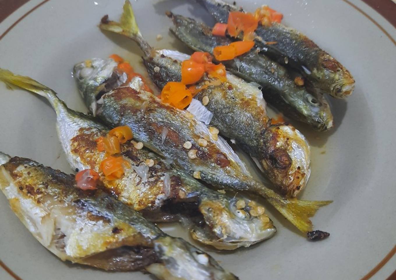 Ikan panggang teflon siram asem jeruk pedas