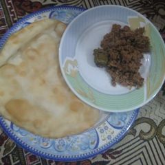 A picture of Qeema with poori.