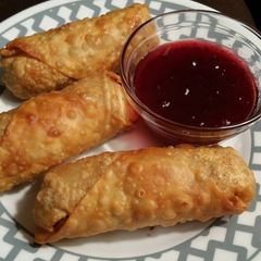 A picture of Thanksgiving Egg Rolls w/ Sweet&Sour Cranberry Sauce.