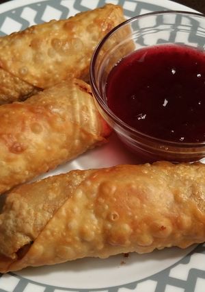 A picture of Thanksgiving Egg Rolls w/ Sweet&Sour Cranberry Sauce.