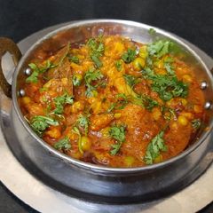 A picture of Cauliflower matar masala gravy.