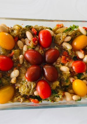A picture of Aubergine and cannellini bean salad.