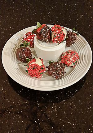 A picture of Holiday White and Dark Chocolate covered Strawberries.