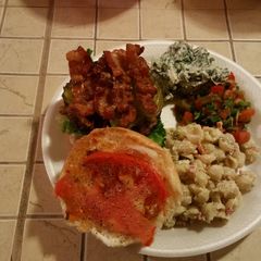 A picture of Chedder Stuffed Bacon Burger with Red Pepper Jelly.