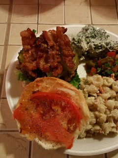 A picture of Chedder Stuffed Bacon Burger with Red Pepper Jelly.