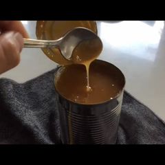 A picture of Caramel Sauce / Dulce De Lache in the Can from Sweetened Condensed Milk.