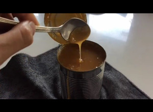A picture of Caramel Sauce / Dulce De Lache in the Can from Sweetened Condensed Milk.