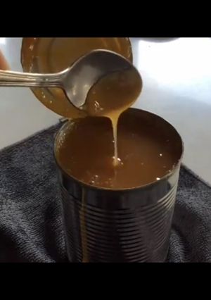 A picture of Caramel Sauce / Dulce De Lache in the Can from Sweetened Condensed Milk.