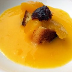 A picture of Cake On Peach Liqueur Coulis Dessert.