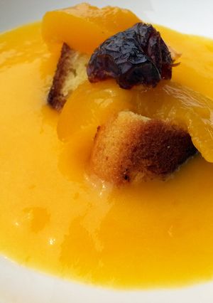 A picture of Cake On Peach Liqueur Coulis Dessert.