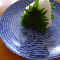 A picture of Steaming Miso Rice Balls Wrapped in Shiso Leaves.