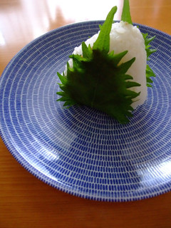 A picture of Steaming Miso Rice Balls Wrapped in Shiso Leaves.