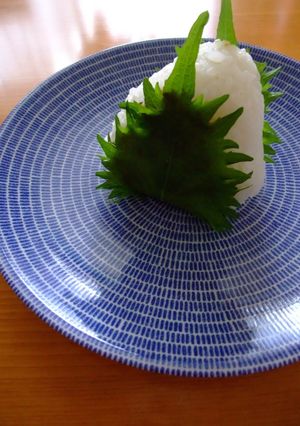A picture of Steaming Miso Rice Balls Wrapped in Shiso Leaves.