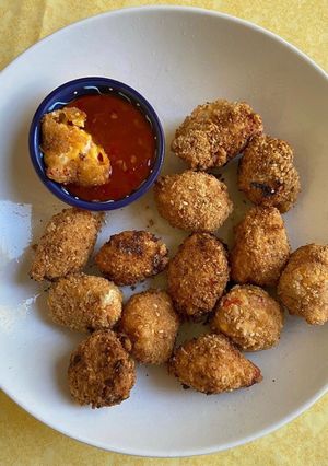 Une photo de Des Jalapeños panés au cheddar