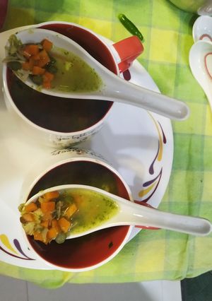 A picture of Chicken coriander soup with vegetables.