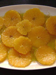 Una foto de Naranjas en Aceite