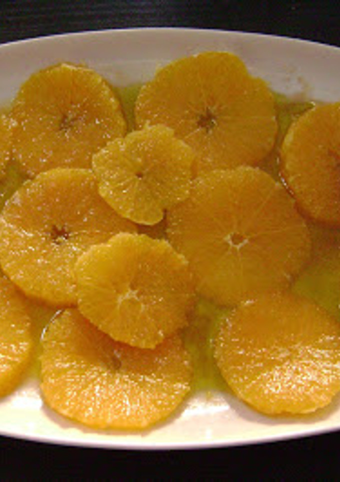 Una foto de Naranjas en Aceite