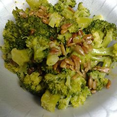 A picture of Broccoli and sunflower seeds.