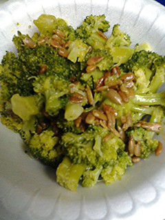 A picture of Broccoli and sunflower seeds.