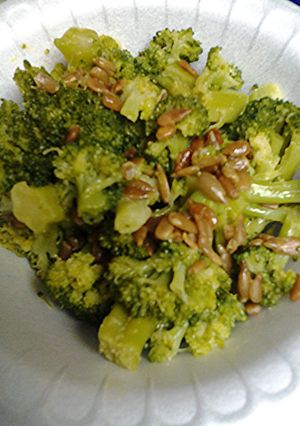 A picture of Broccoli and sunflower seeds.