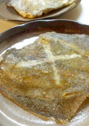 A picture of Deep-fried Flounder Fish Made in a Frying Pan.