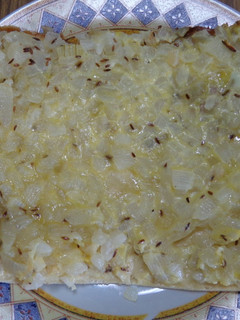 Una foto de Kuchen (pizza) de cebollas