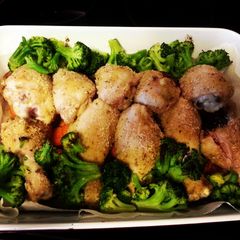 A picture of Roasted Chicken, potatoes and veggies.