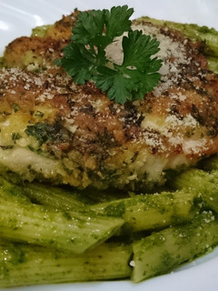 A picture of Parmesan and Parsley, Rosemary Crusted Chicken.