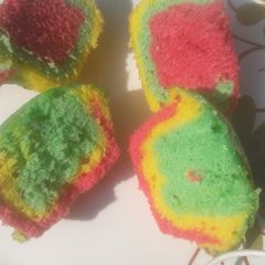 A picture of Rainbow cupcakes.