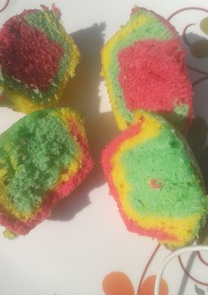 A picture of Rainbow cupcakes.