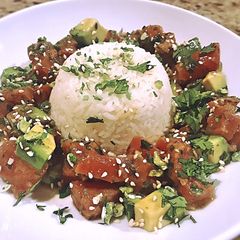 A picture of Tuna poke with coconut rice and Bibb lettuce.