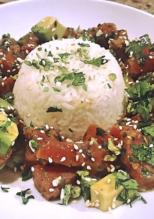 A picture of Tuna poke with coconut rice and Bibb lettuce.