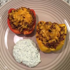 A picture of Stuffed Peppers With Cilantro-Lime Sauce.