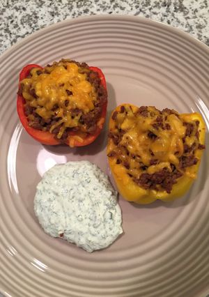 A picture of Stuffed Peppers With Cilantro-Lime Sauce.
