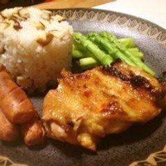 A picture of Tandoori Chicken with Buttered Rice.