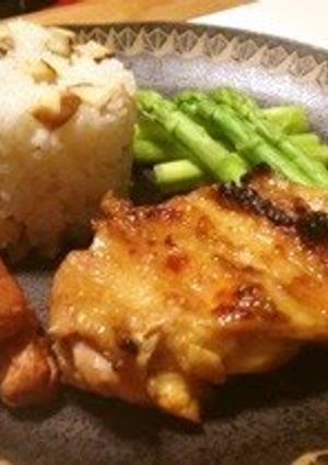 A picture of Tandoori Chicken with Buttered Rice.