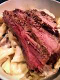 Flank Steak over Tortellini in Parmesan Cream sauce
