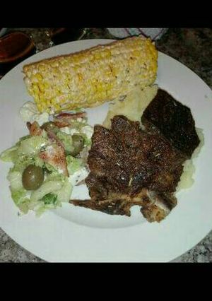 A picture of Grilled meat and salads.
