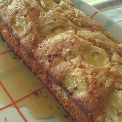 A picture of Yummy Banana Cake with almonds and nuts.
