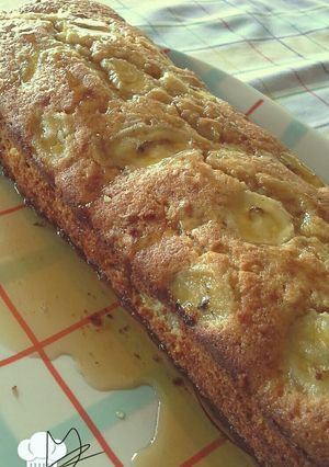 A picture of Yummy Banana Cake with almonds and nuts.